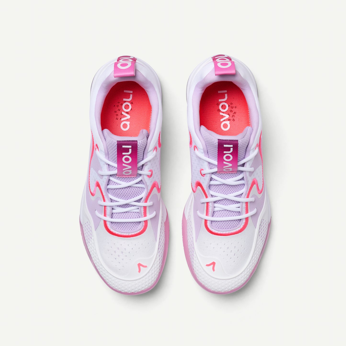 Pair of white and pink sneakers with 'avoli' branding on a light gray background
