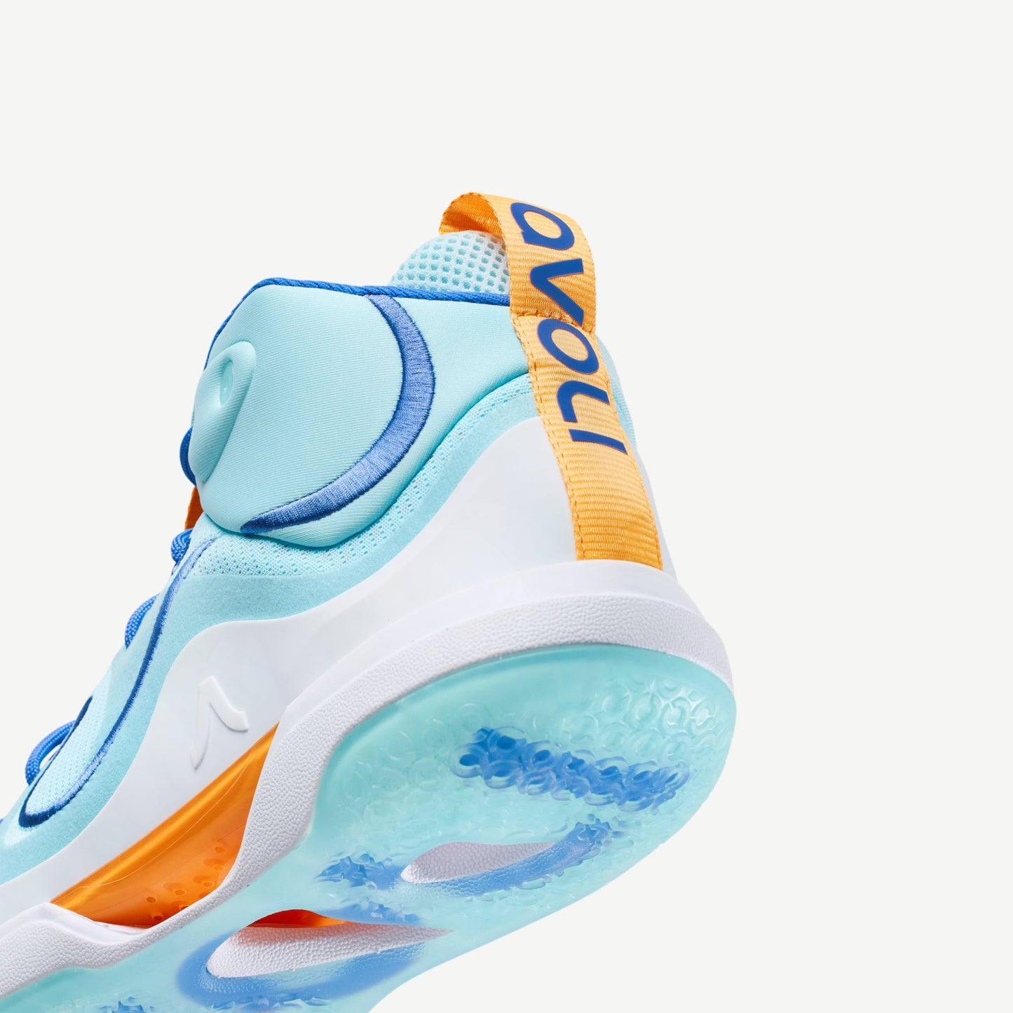 A pair of mid-top volleyball sneakers with blue and orange color scheme, featuring a white midsole and blue outsole.