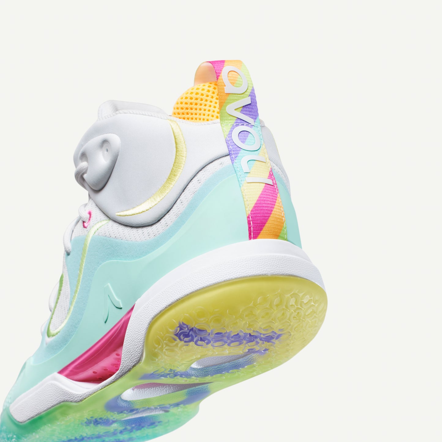 Colorful green and white sneaker with a gradient design on a white background