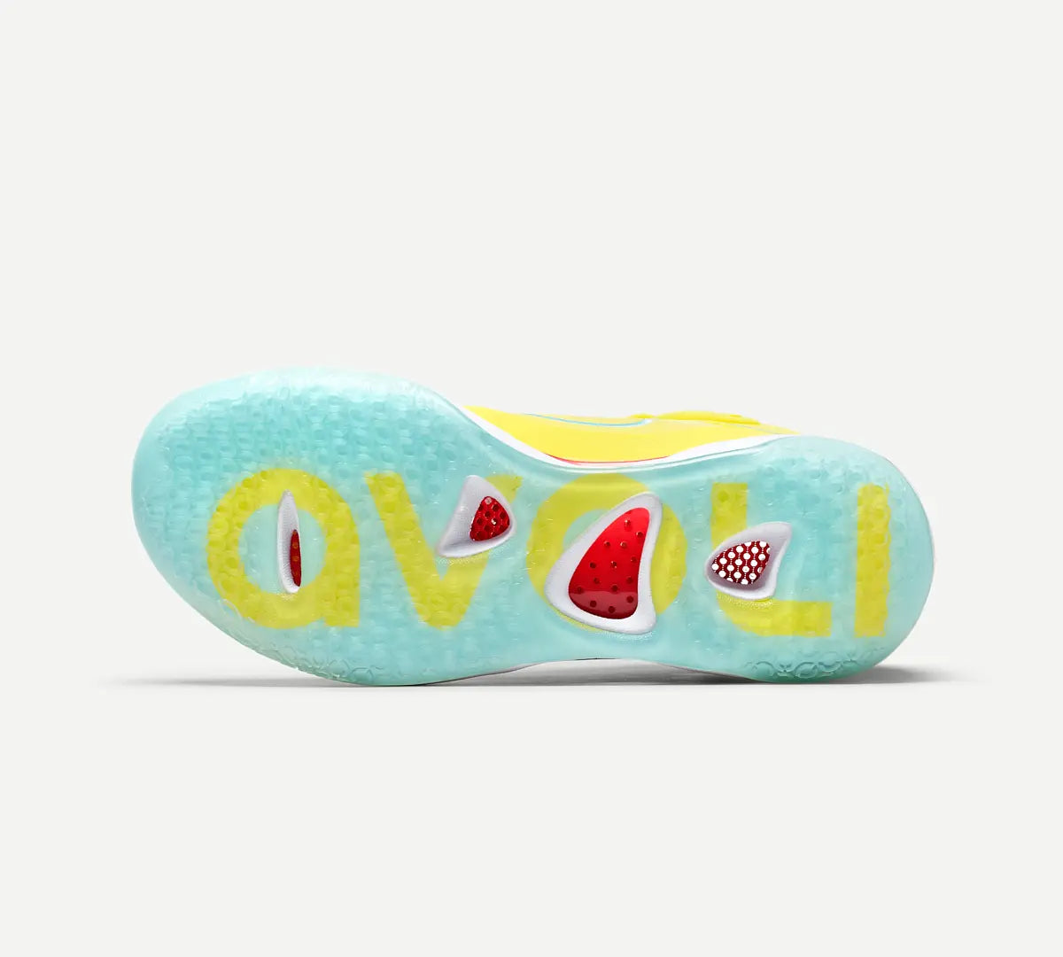 Light blue outsole of yellow volleyball shoe with blue accents and a white midsole.