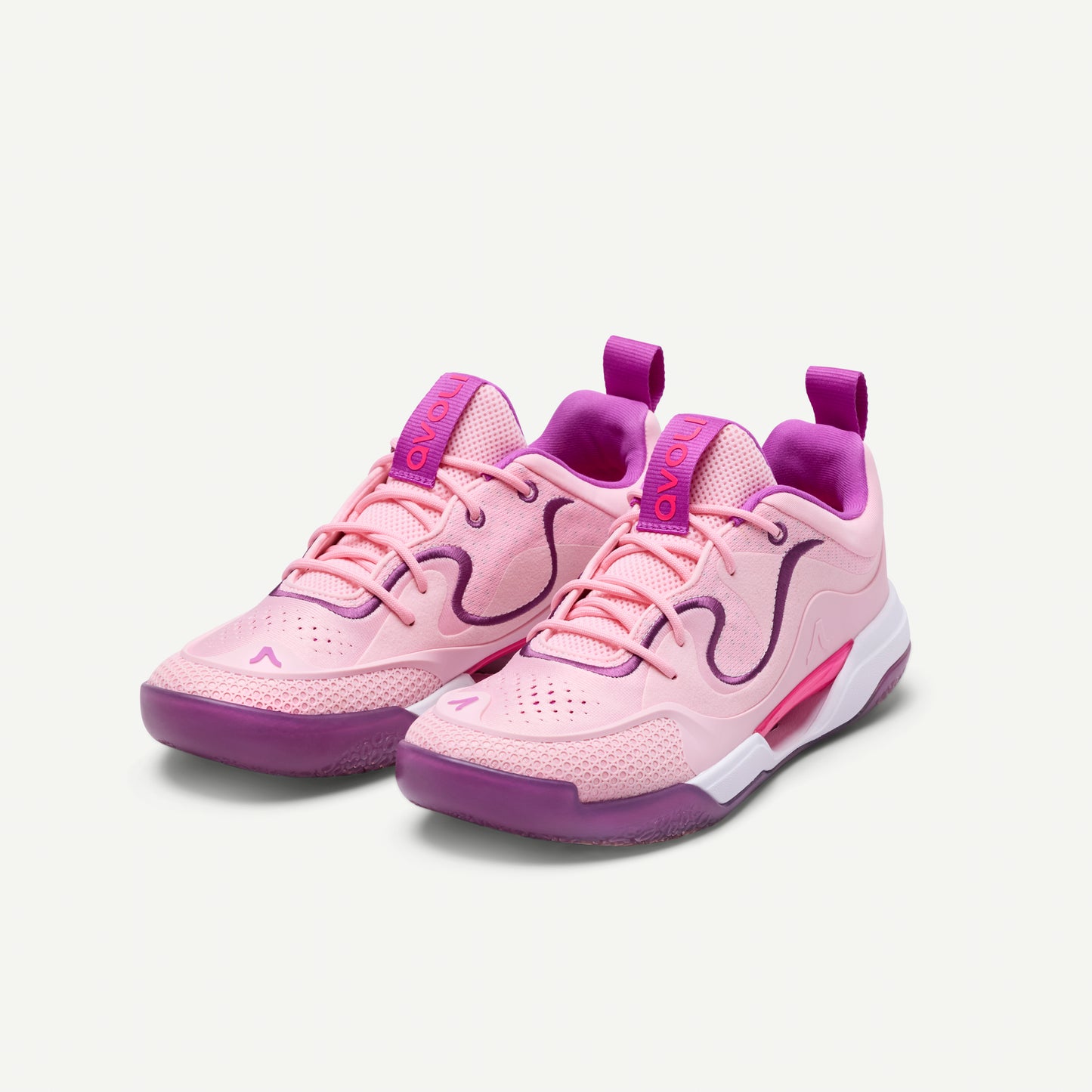 Pink and purple low top volleyball sneaker on a white background