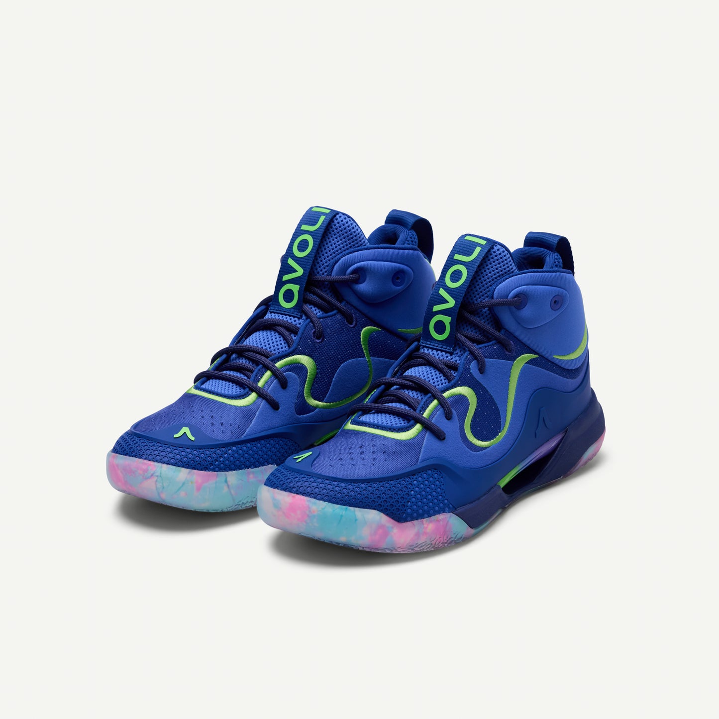 Blue volleyball shoe with colorful sole on a white background