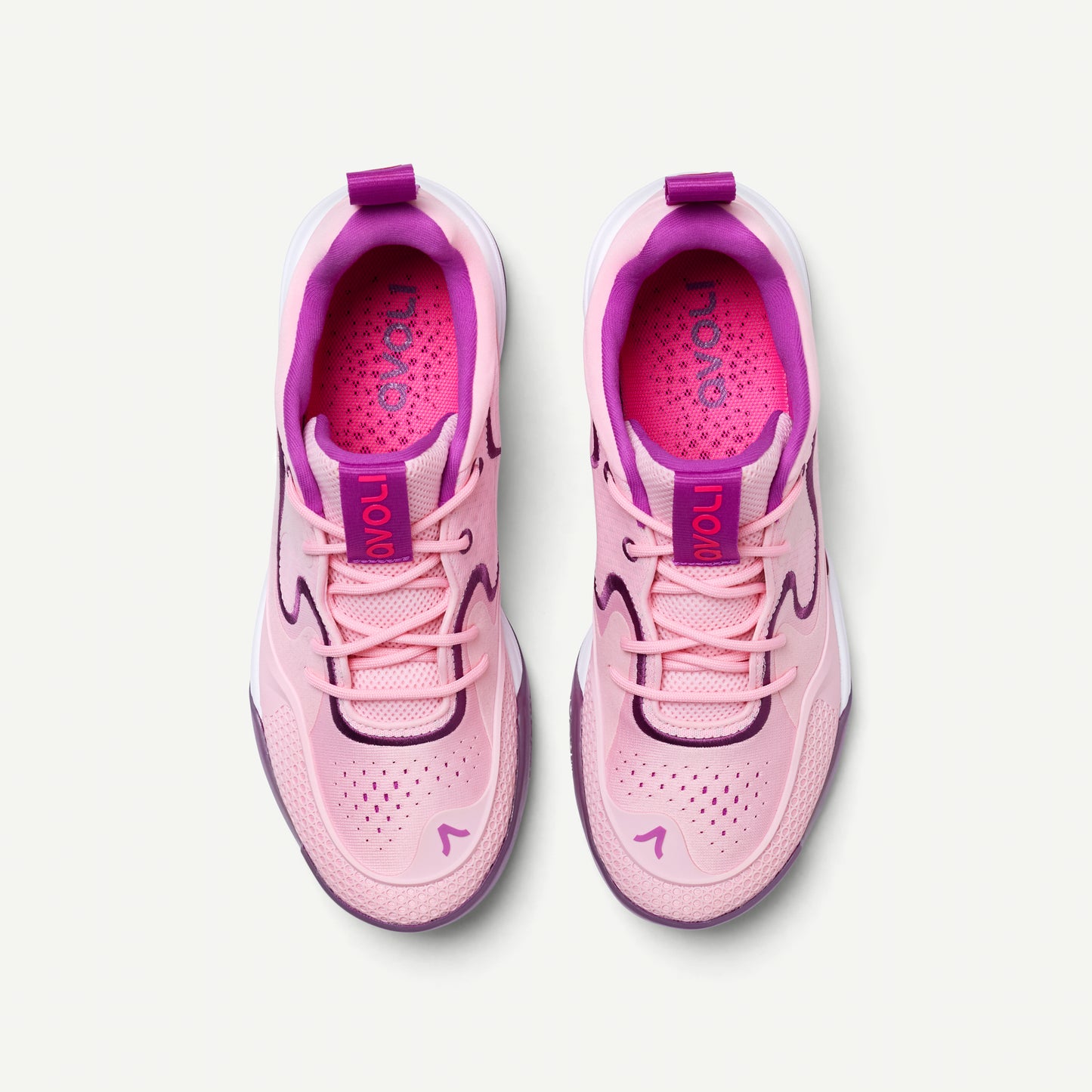 Pink and purple low top volleyball sneaker on a white background