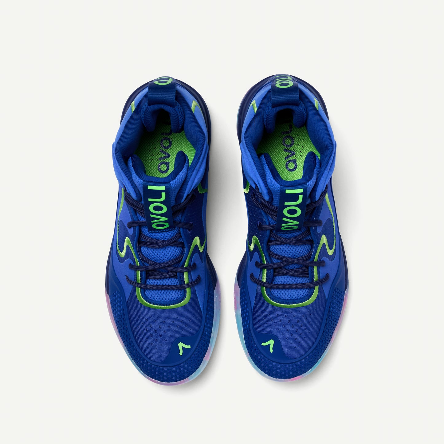 Blue volleyball shoe with colorful sole on a white background