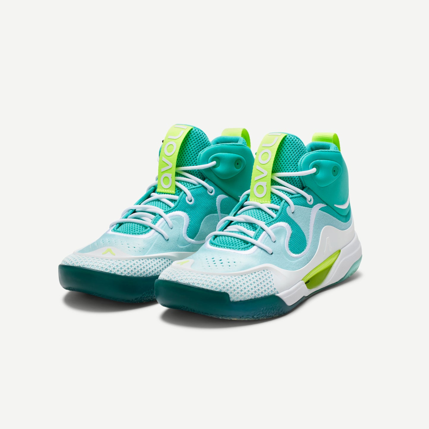 A pair of volleyball shoes with a white and green color scheme, featuring a mid-top design with Avoli branding on the side.