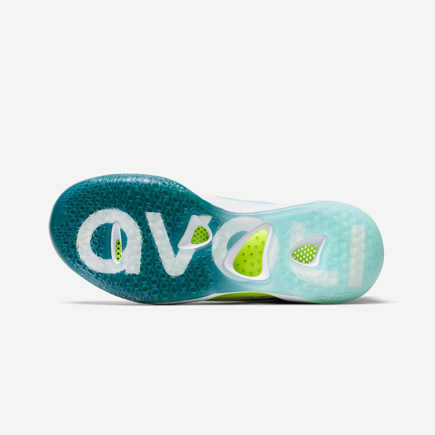 Outsole of a white and green  volleyball shoes with reinforced toe protection and superior traction designed for court play.