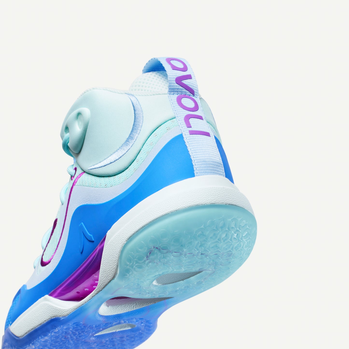 Multi-colored blue and purple volleyball mid-top sneaker on a white background