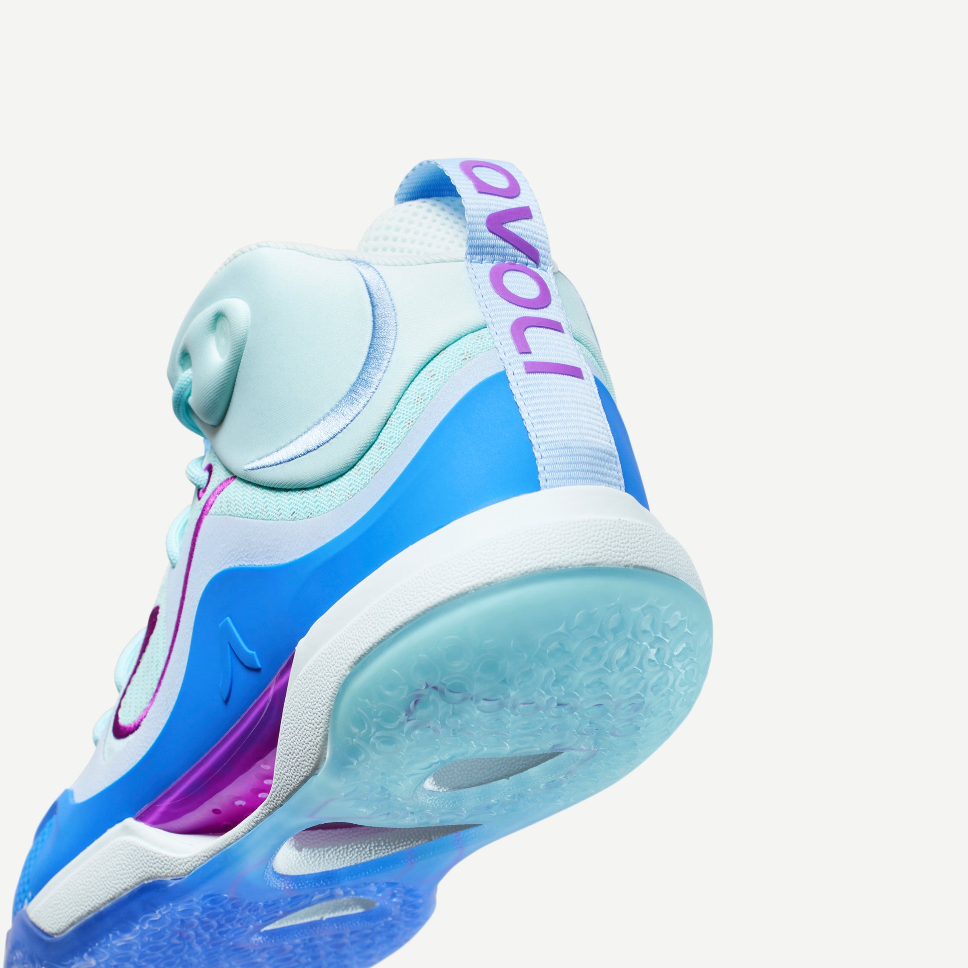 Multi-colored blue and purple volleyball mid-top sneaker on a white background