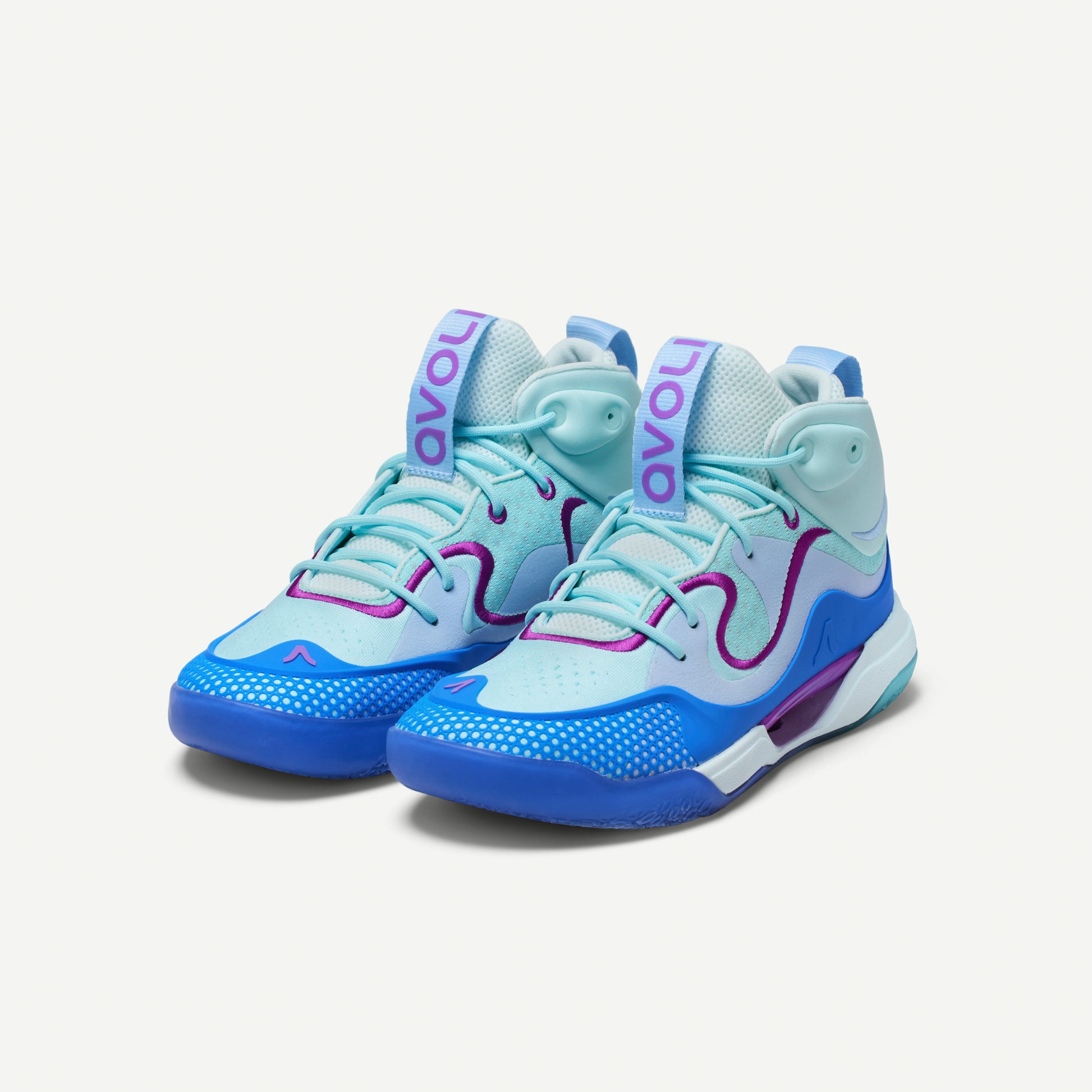 Multi-colored blue and purple volleyball mid-top sneakers on a white background