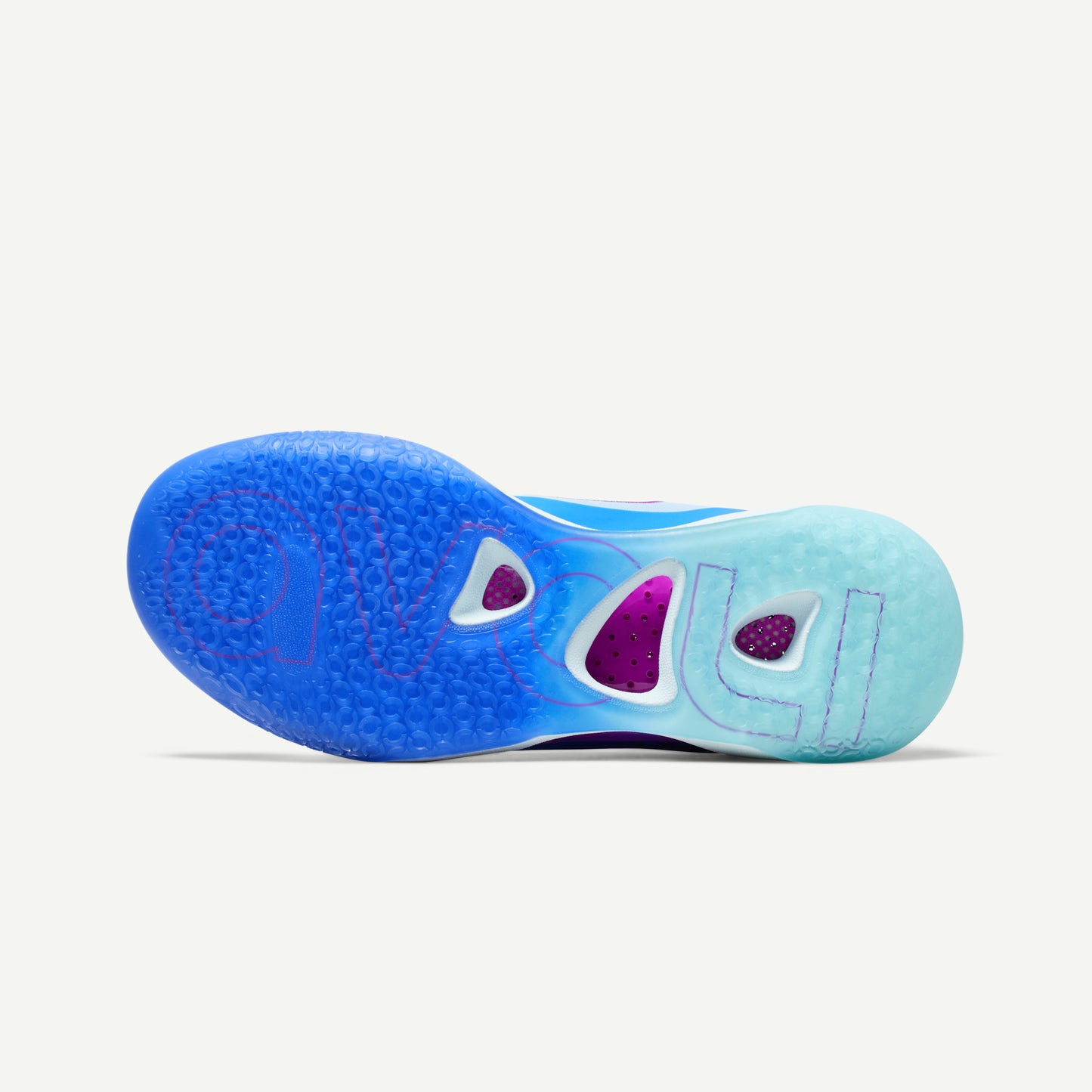 Multi-colored blue and purple volleyball mid-top sneaker sole on a white background
