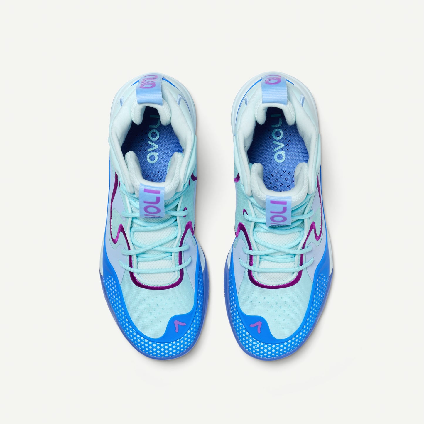Multi-colored blue and purple volleyball mid-top sneakers on a white background
