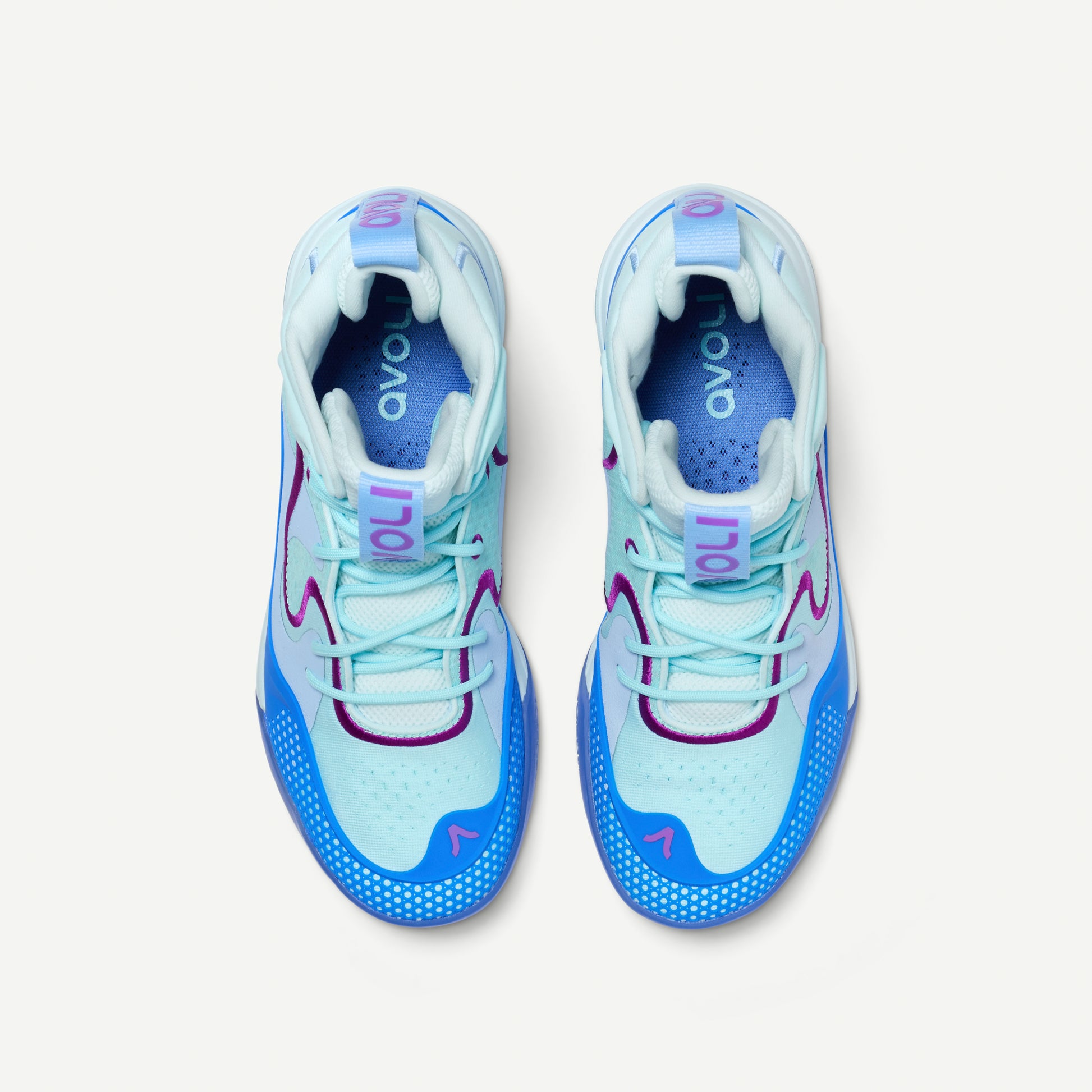 Multi-colored blue and purple volleyball mid-top sneakers on a white background