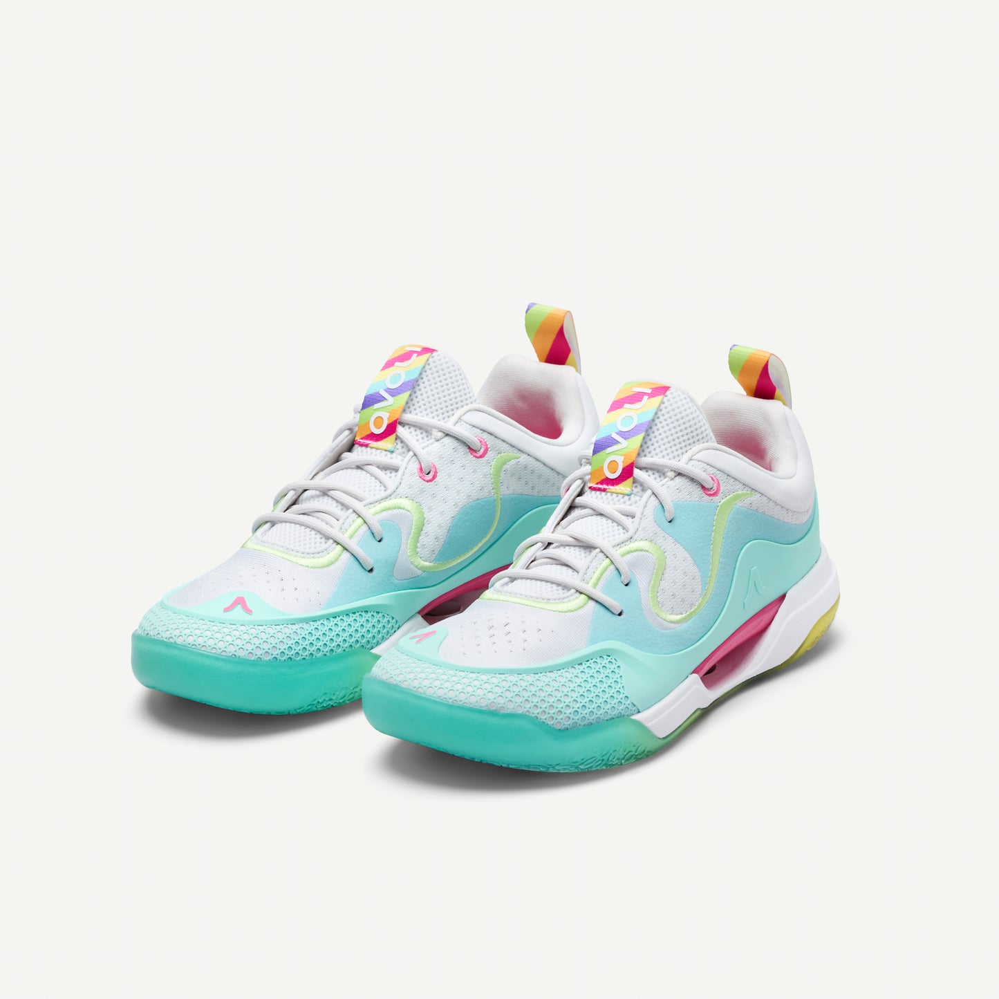 Multicolored low top volleyball sneaker in light green with yellow and red accents volleyball sneaker on a white background