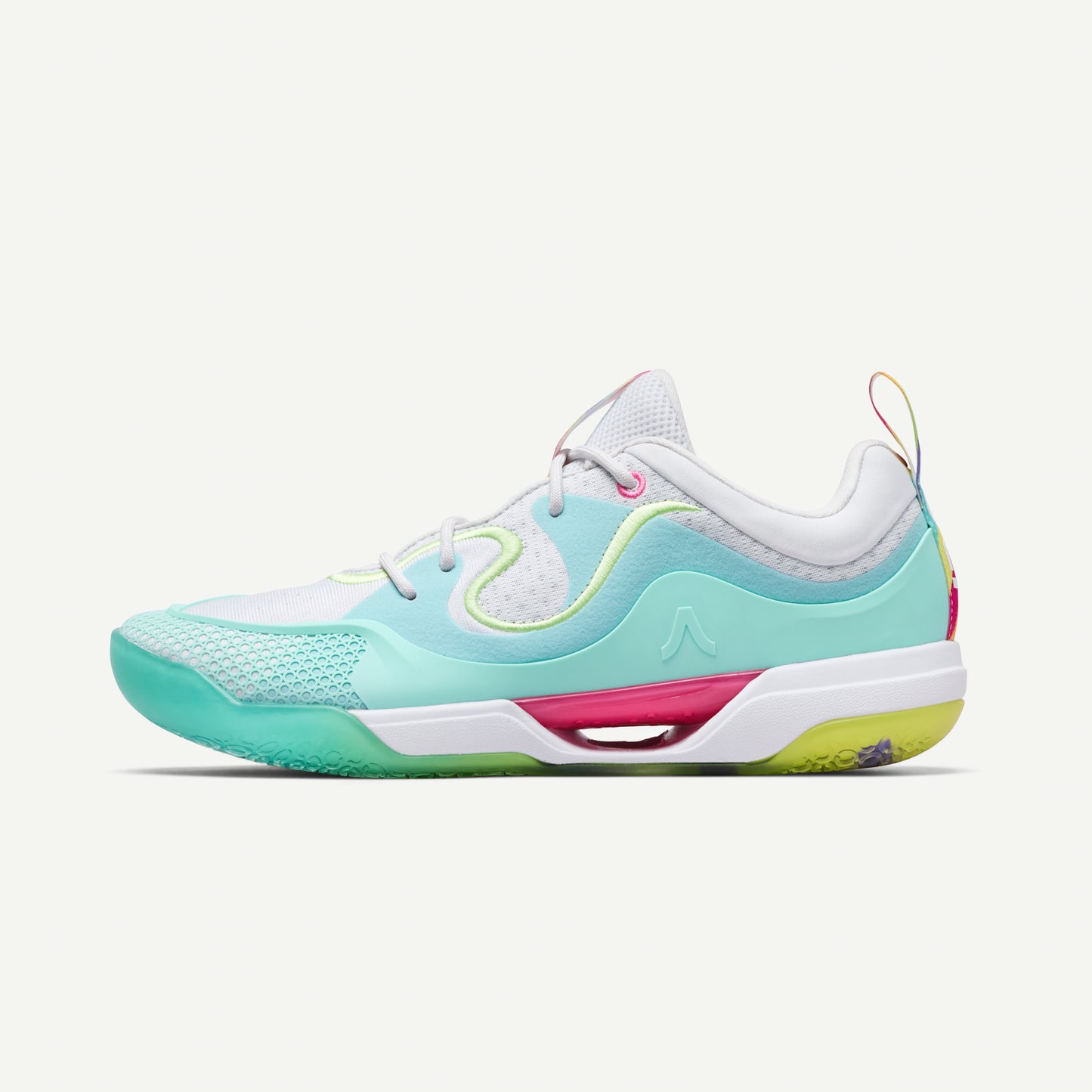 Multicolored low top volleyball sneaker in light green with yellow and red accents volleyball sneaker on a white background