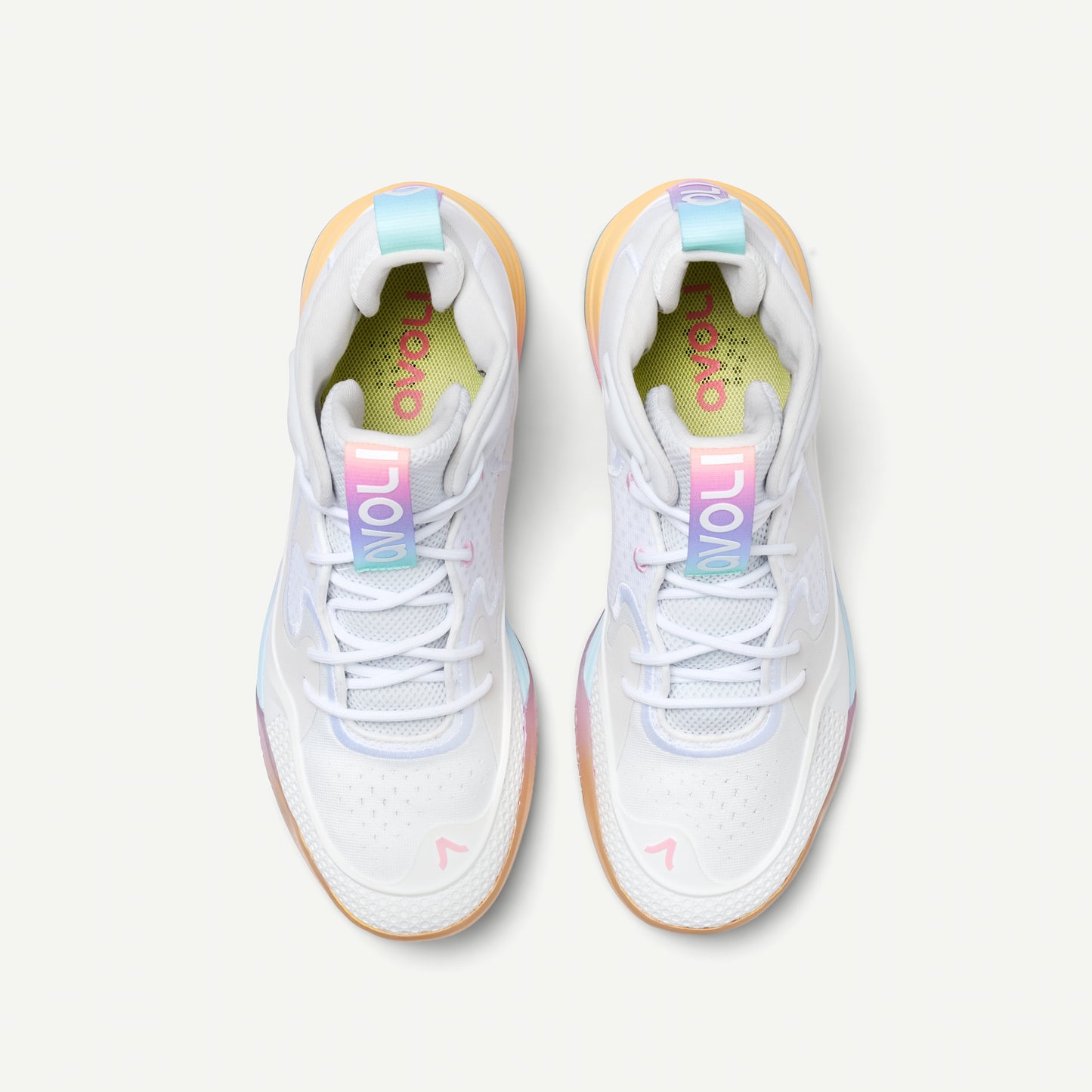 White avoli volleyball sneaker with colorful sole on a white background
