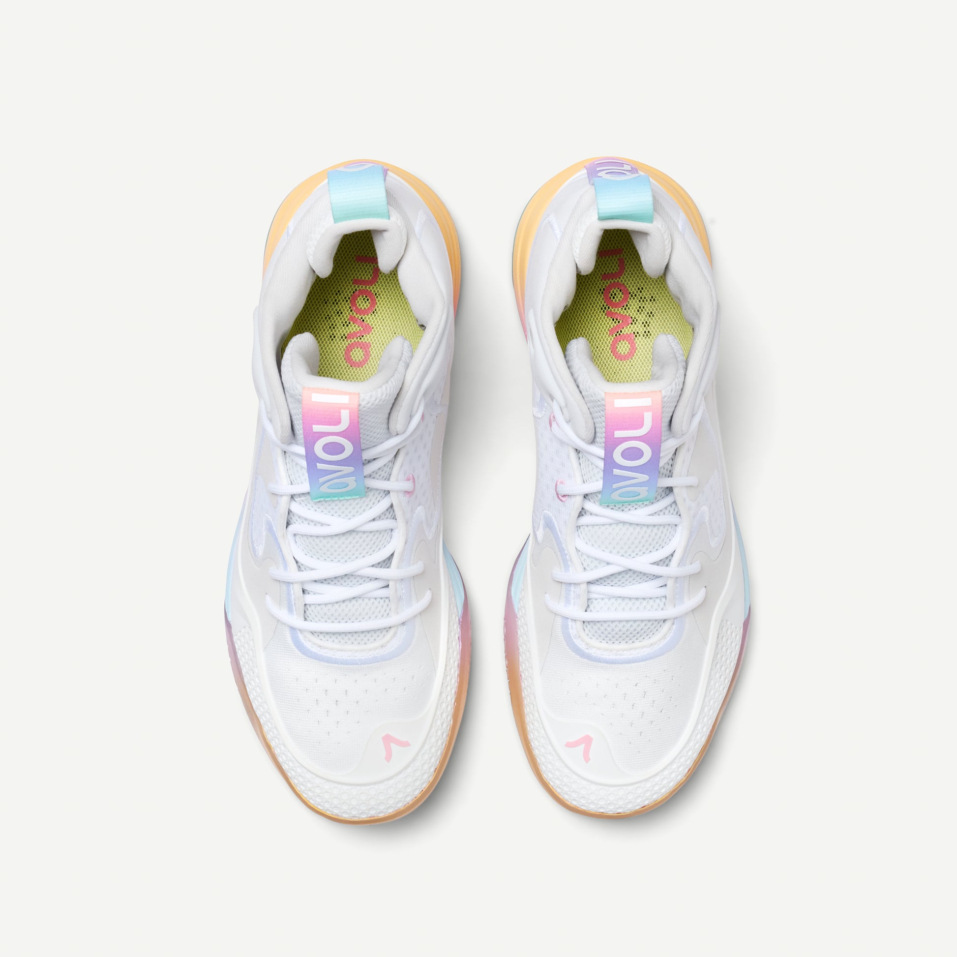 White avoli volleyball sneaker with colorful sole on a white background