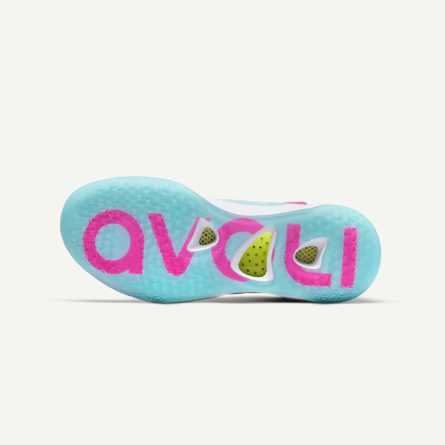 Colorful sneaker sole with pink, blue, and white design on a light gray background