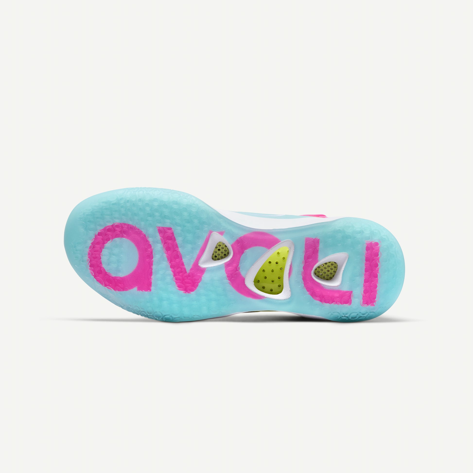 Colorful sneaker sole with pink, blue, and white design on a light gray background