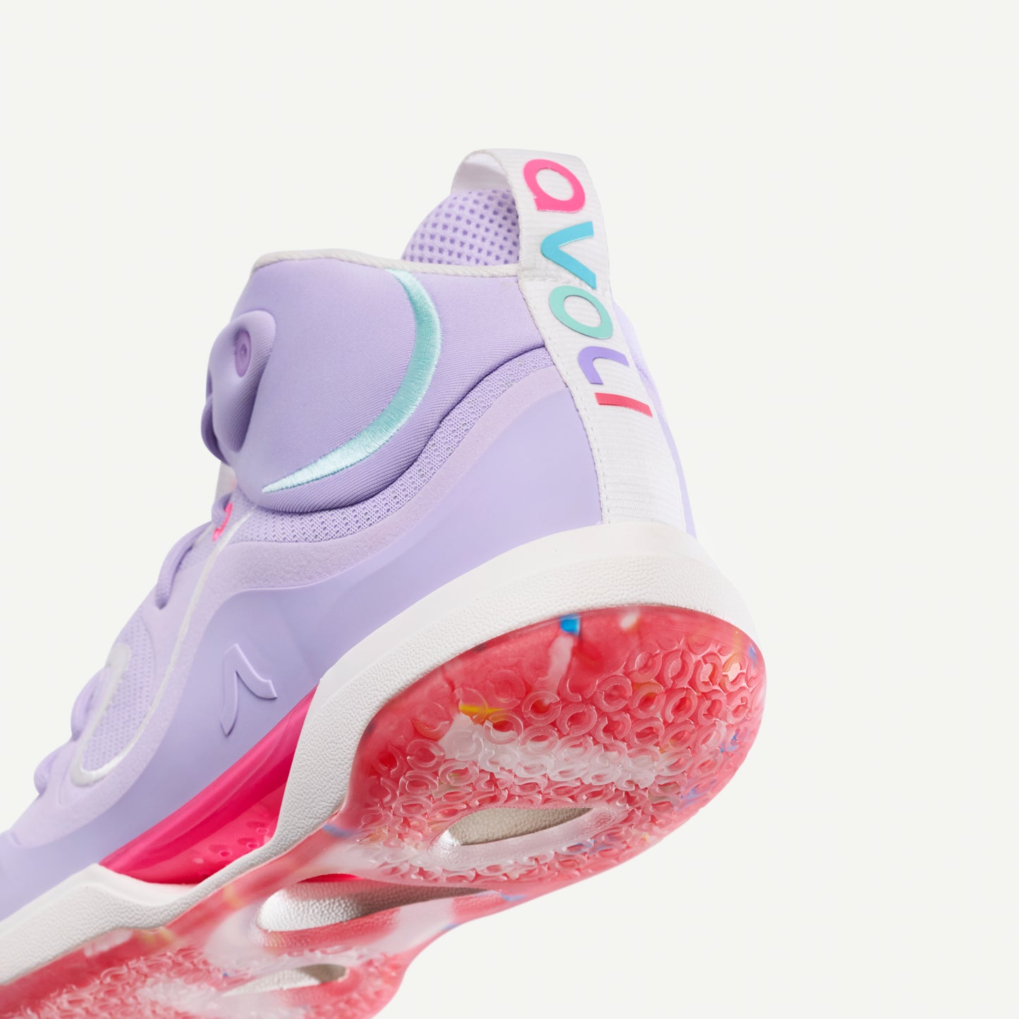 Purple and pink volleyball mid-top sneaker on a white background