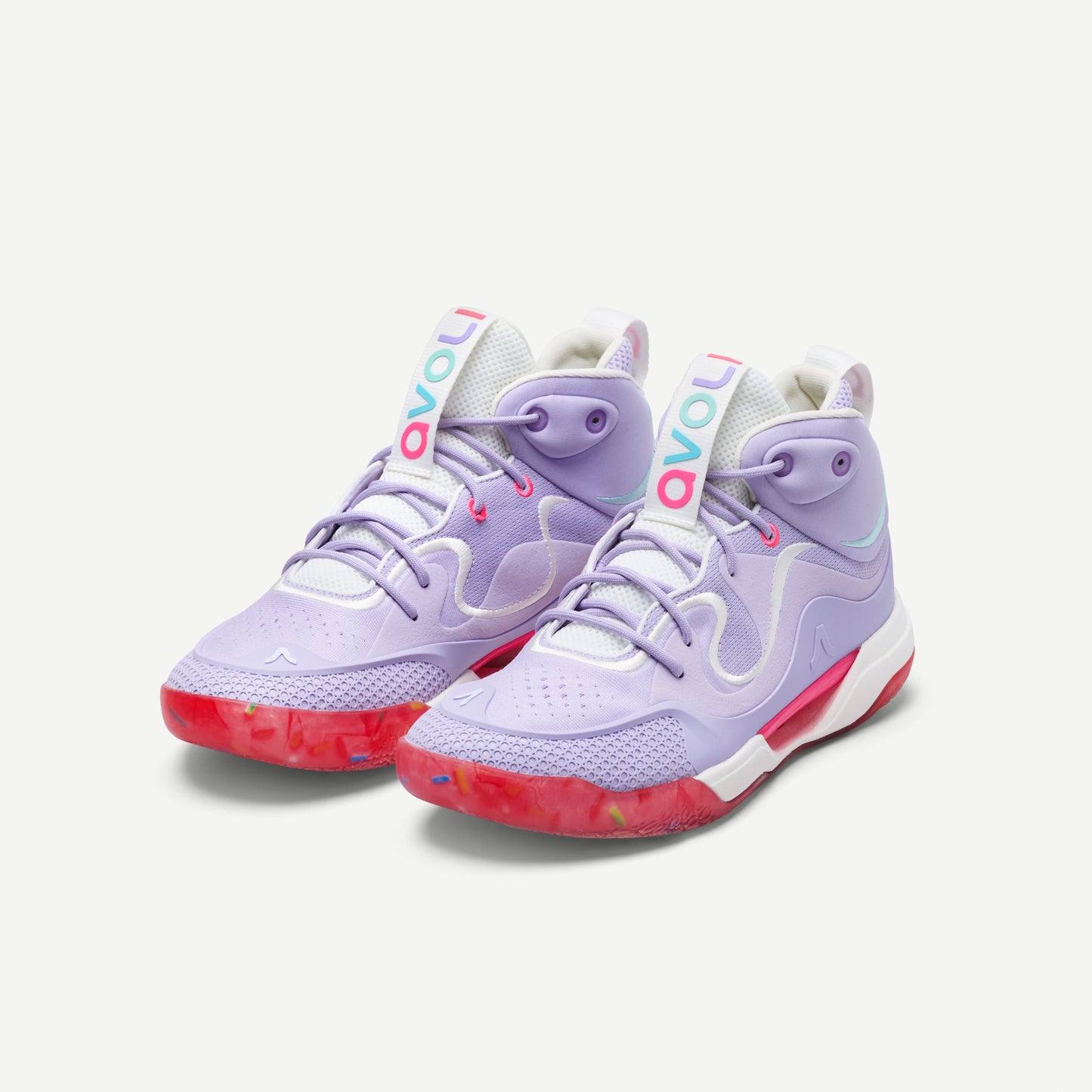 Purple and pink volleyball mid-top sneakers on a white background