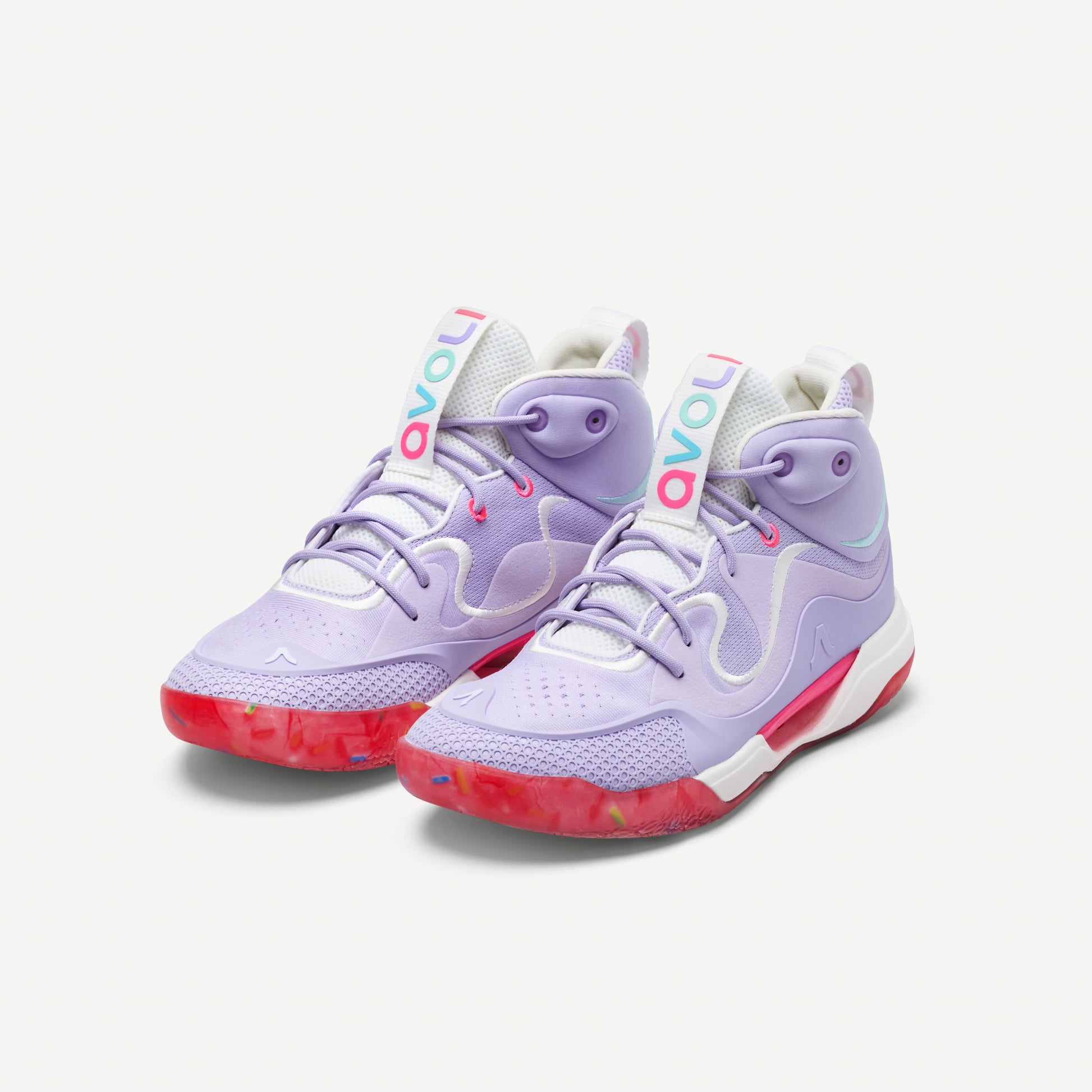 Purple and pink volleyball mid-top sneakers on a white background