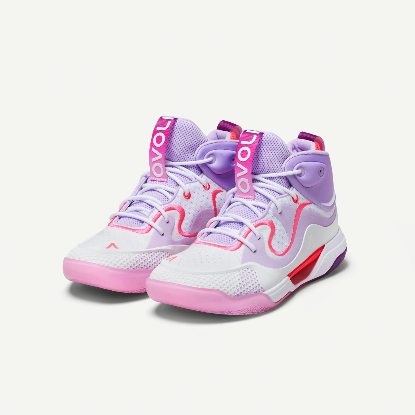 White, lavender, pink and purple mid-top volleyball sneaker with red accents on a white background