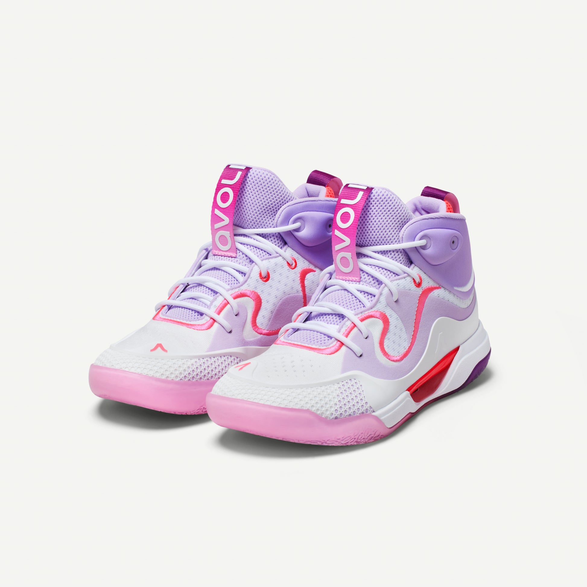 White, lavender, pink and purple mid-top volleyball sneaker with red accents on a white background