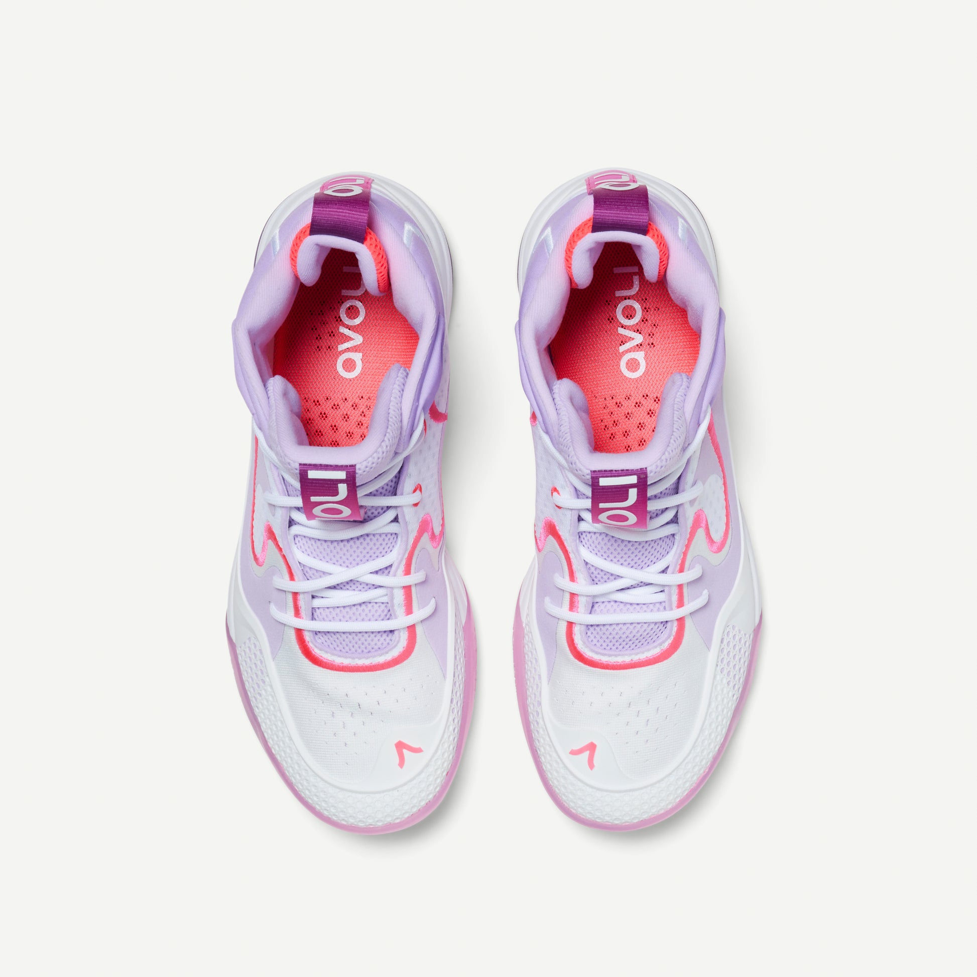 White, lavender, pink and purple mid-top volleyball sneakers with red accents on a white background