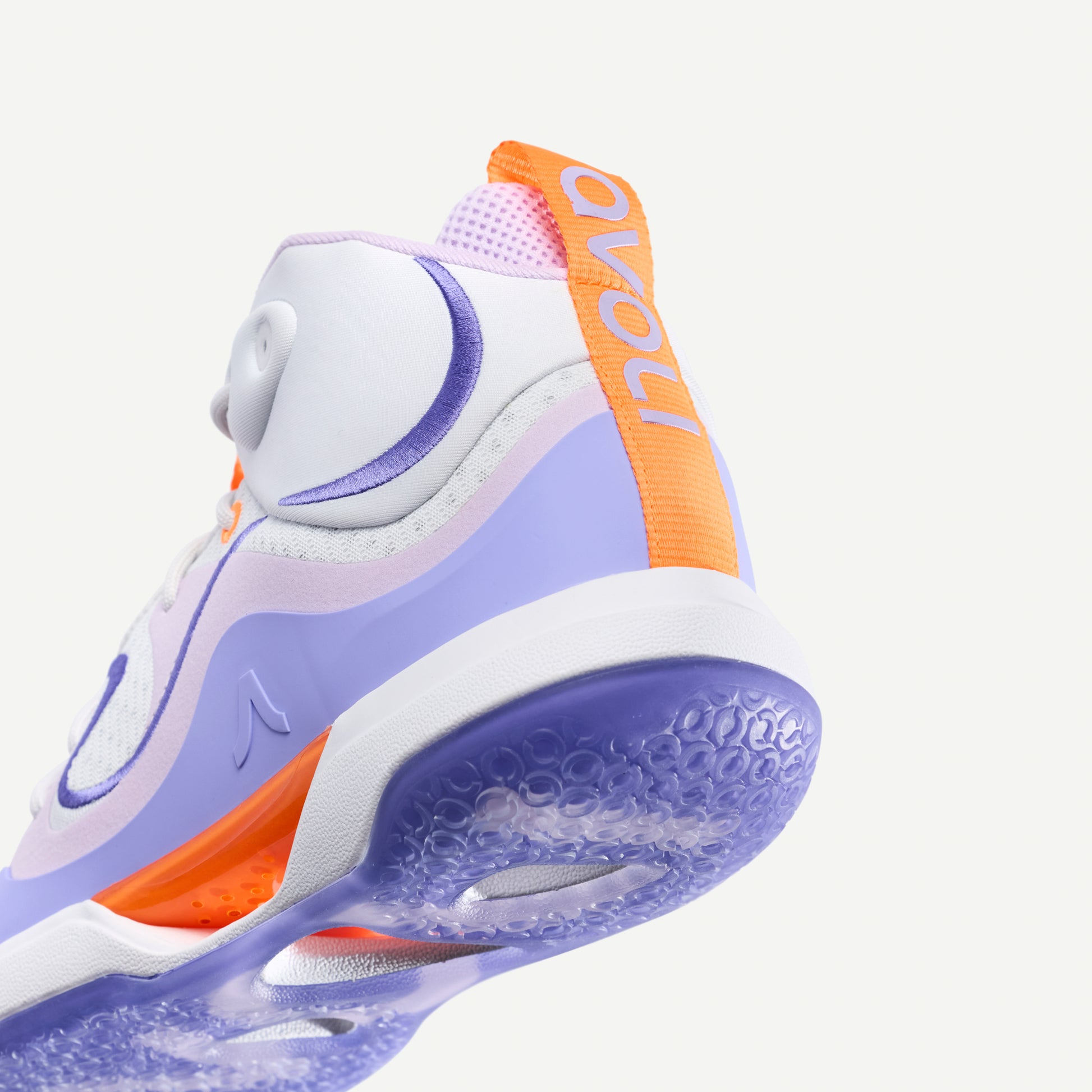 Mid Top Volleyball shoe with purple and orange accents on a white background
