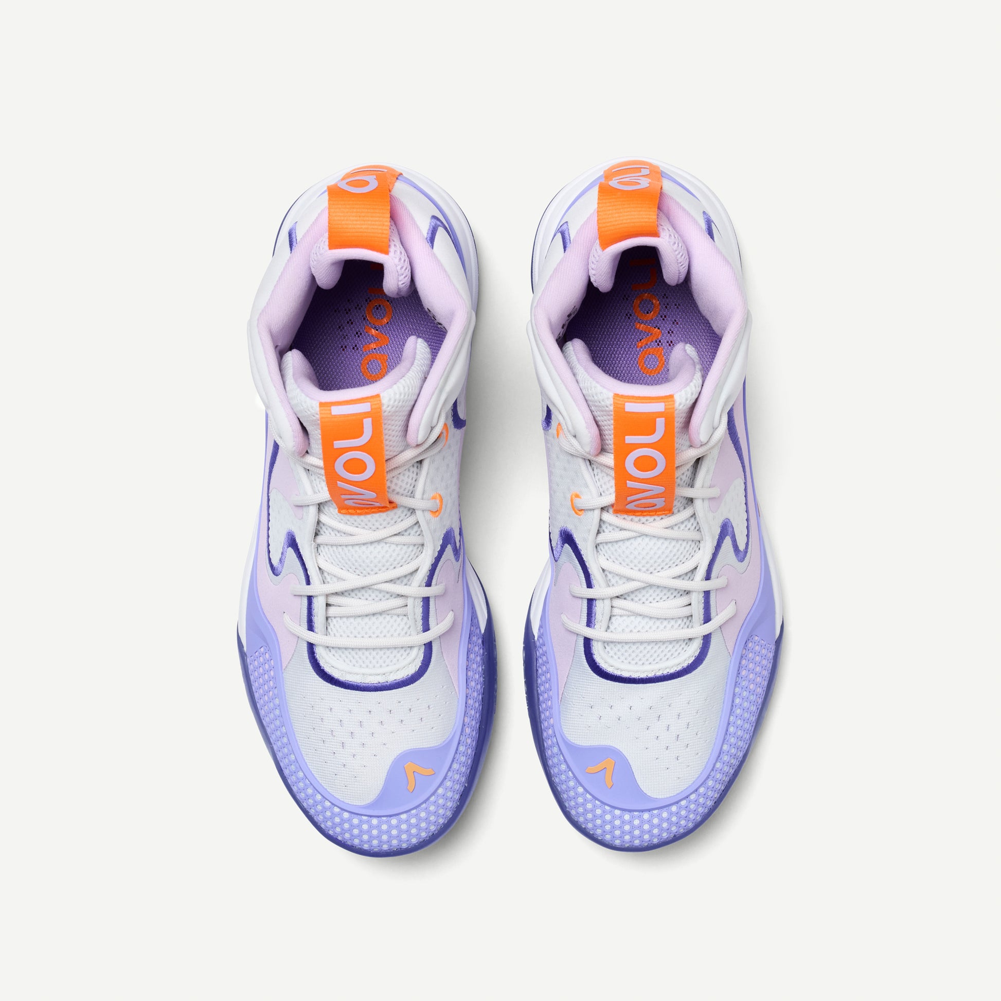 Mid Top Volleyball shoe with purple and orange accents on a white background