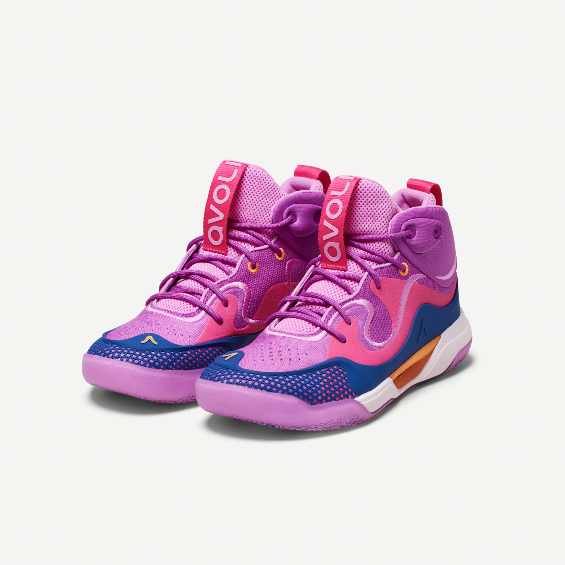 Colorful mid-top volleyball shoes with purple and pink design, with blue and orange accents on a white background