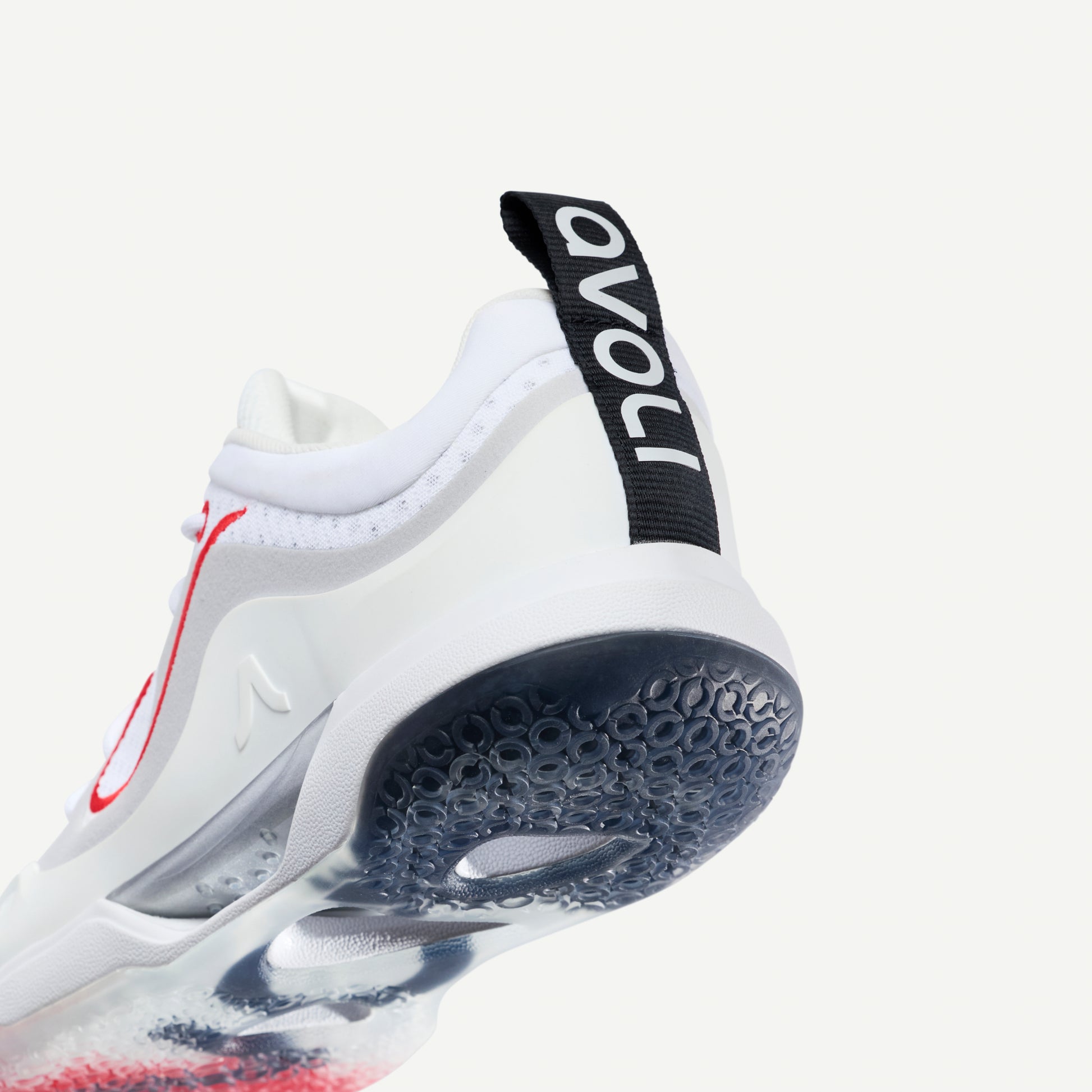 White volleyball sneaker heel with red accents on a white background and avoli brand logo