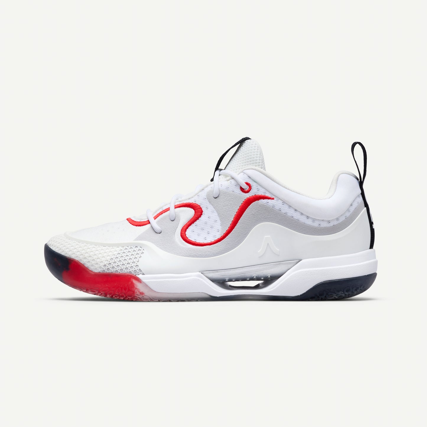 White volleyball sneaker with red accents on a white background