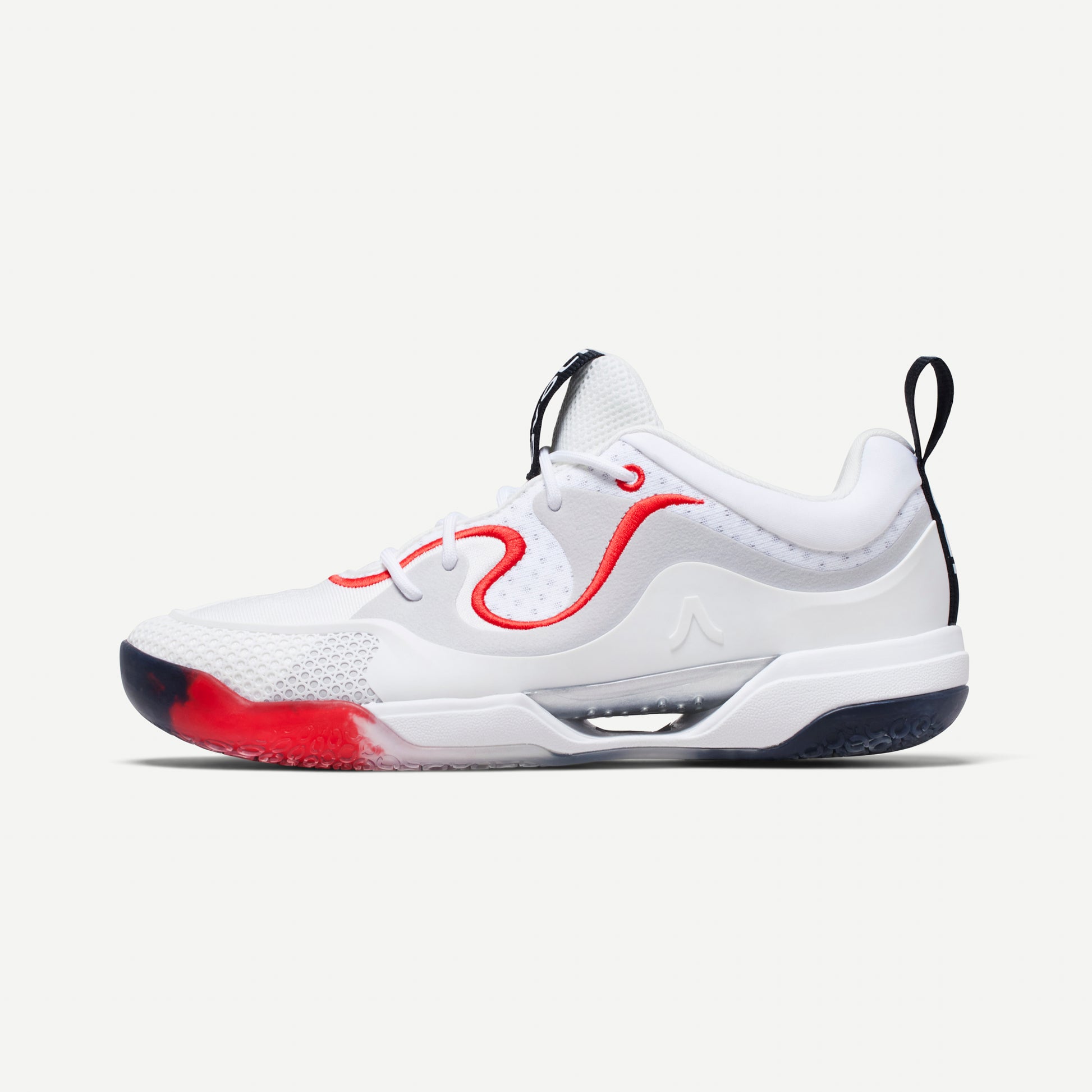 White volleyball sneaker with red accents on a white background