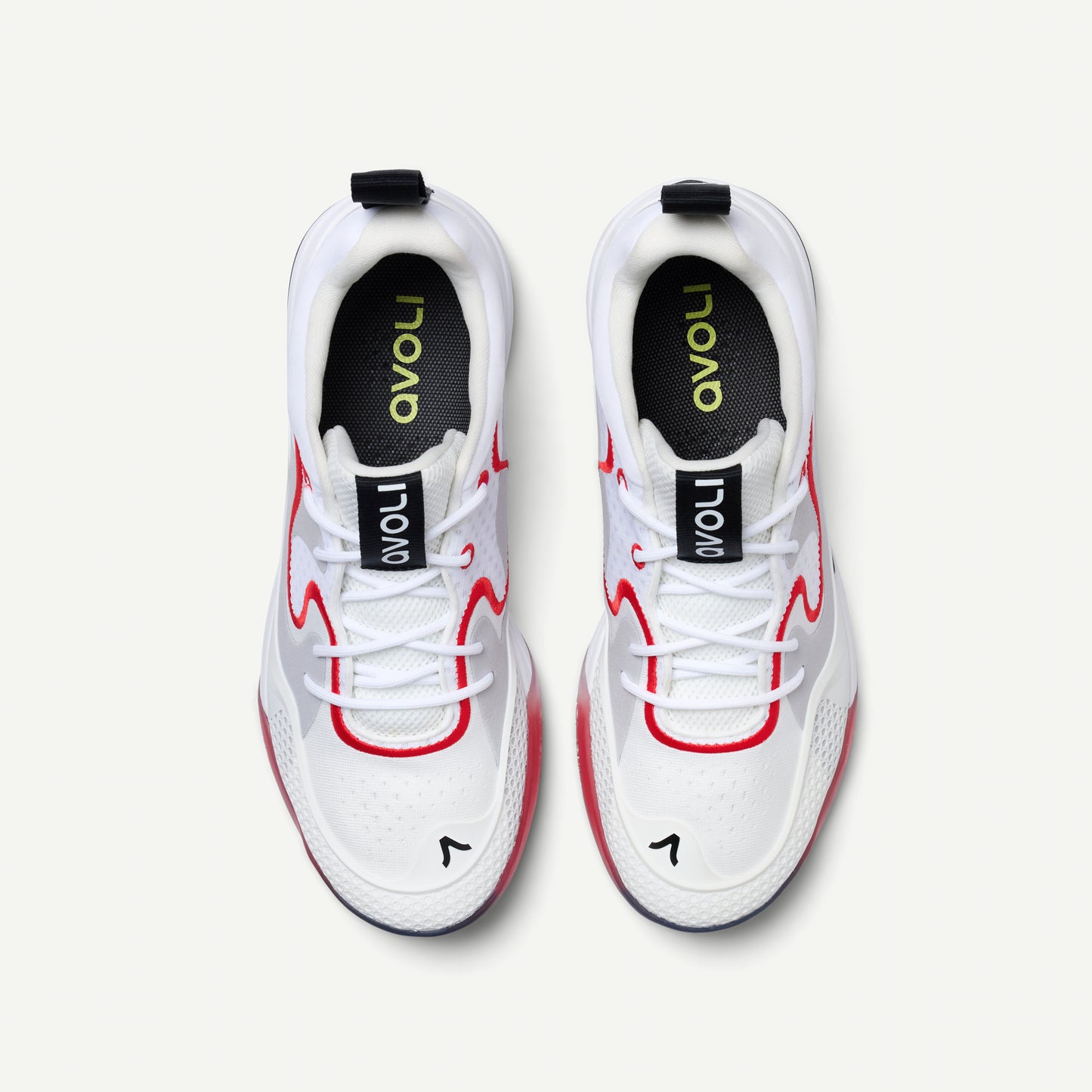 White sneakers with red accents and 'avoli' branding on a light gray background