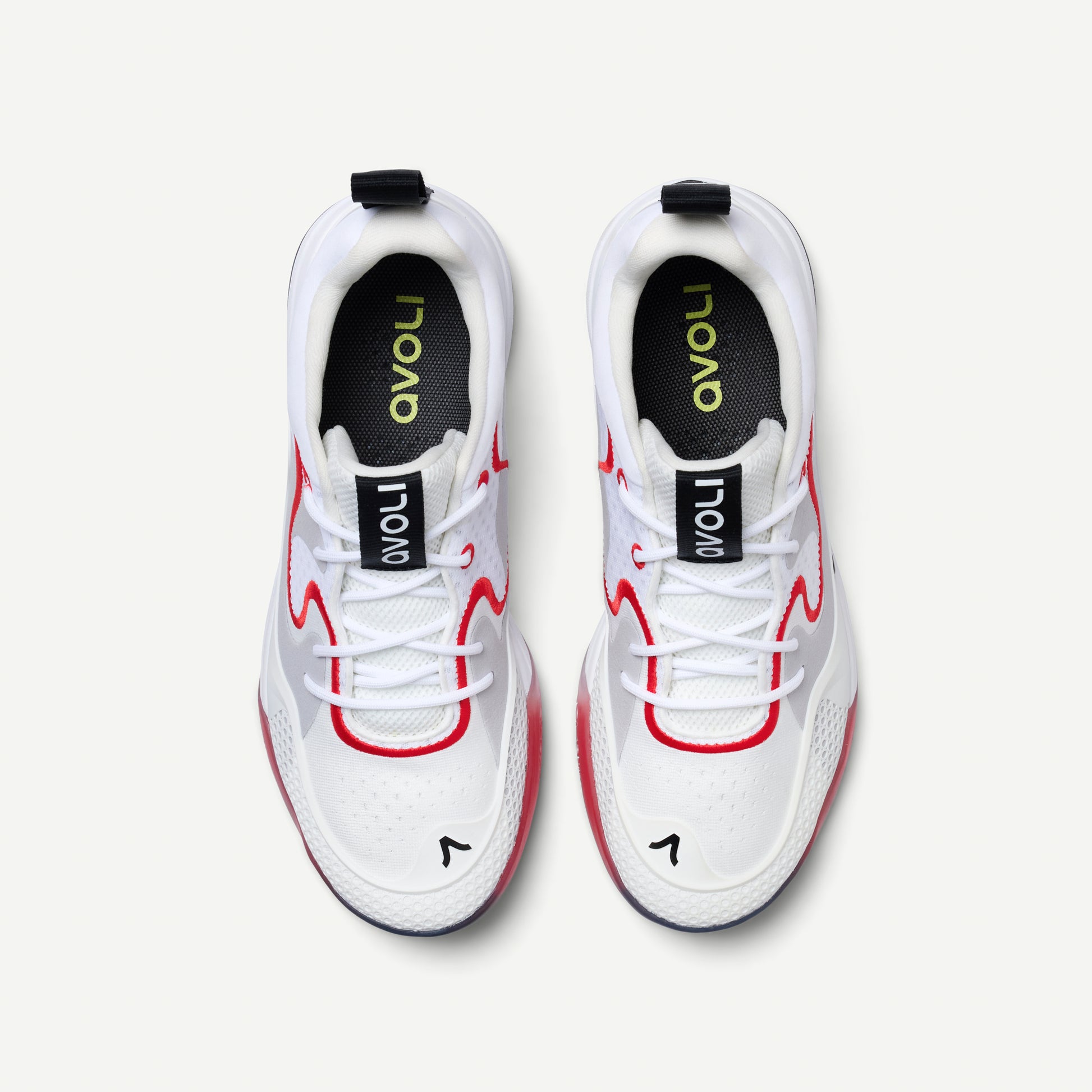White sneakers with red accents and 'avoli' branding on a light gray background