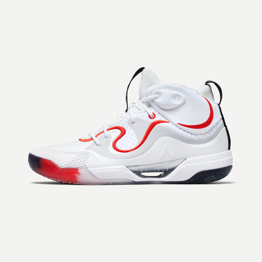 White mid-top volleyball sneaker with red accents on a white background