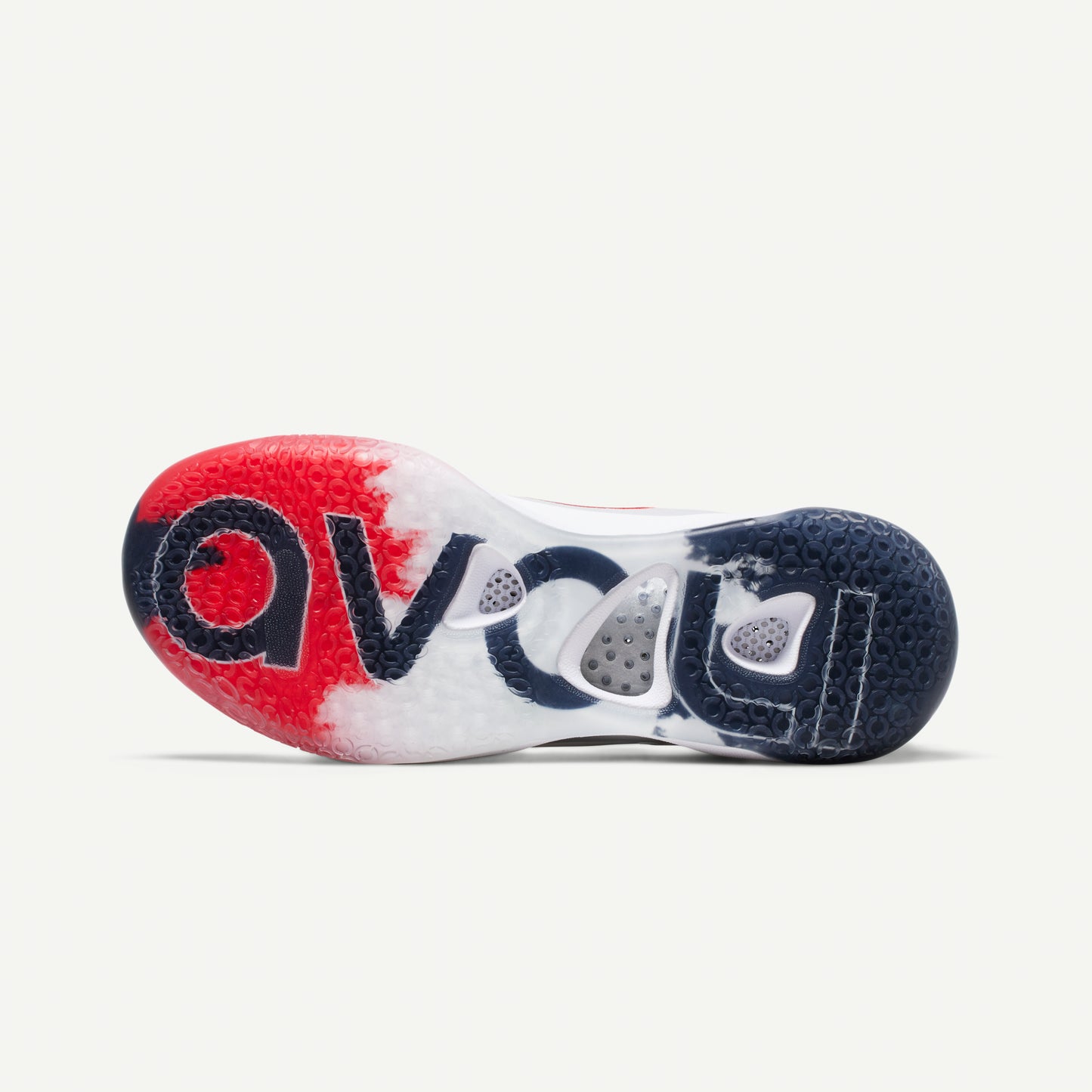 White mid-top volleyball sneaker sole with red accents on a white background