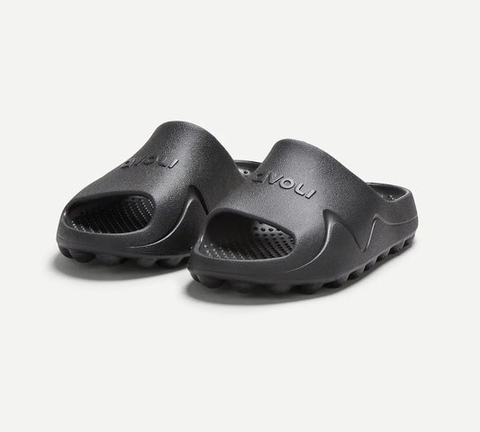 Avoli slide in black, displayed on a neutral background.